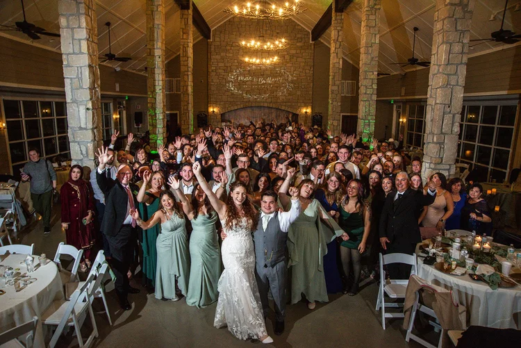 Guests celebrating during reception at Bryan TX wedding venue